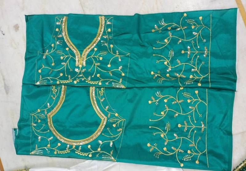 Elegant Off White & Emerald Green Lehenga Choli with Zari Embroidery