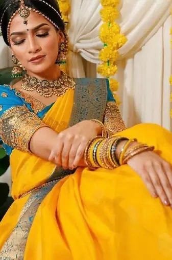 Yellow rama silk blend banarasi saree with unstitched blouse piece