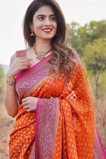 Orange silk blend banarasi saree with unstitched blouse piece