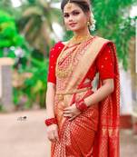 Red silk blend banarasi saree with unstitched blouse piece