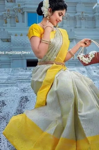 White yellow silk blend banarasi saree with unstitched blouse piece