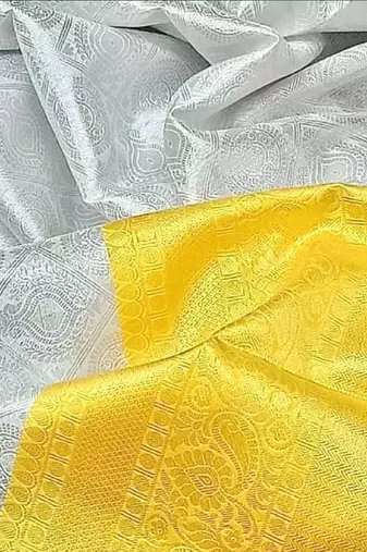 White yellow silk blend banarasi saree with unstitched blouse piece
