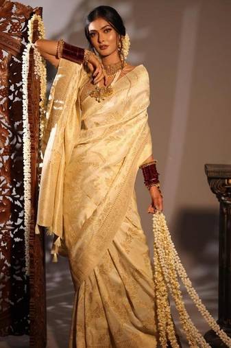 Off white soft silk blend banarasi jacuard work designer party wear saree with unstitched blouse piece