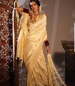 Off white soft silk blend banarasi jacuard work designer party wear saree with unstitched blouse piece