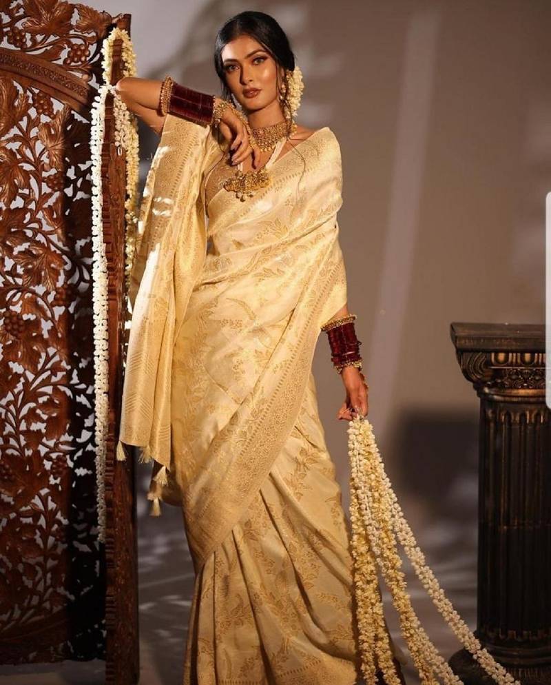 Off white soft silk blend banarasi jacuard work designer party wear saree with unstitched blouse piece