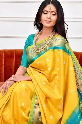 Yellow turquoise silk blend banarasi saree with unstitched blouse piece