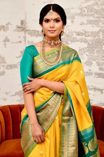 Yellow turquoise silk blend banarasi saree with unstitched blouse piece