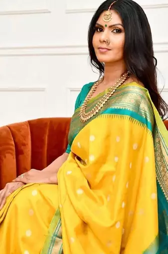 Yellow turquoise silk blend banarasi saree with unstitched blouse piece