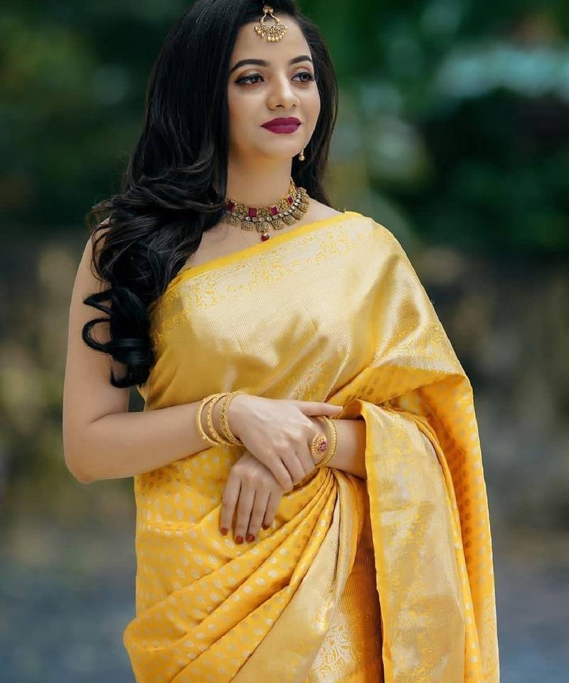 Yellow soft silk blend banarasi jacuard work designer party wear saree with unstitched blouse piece