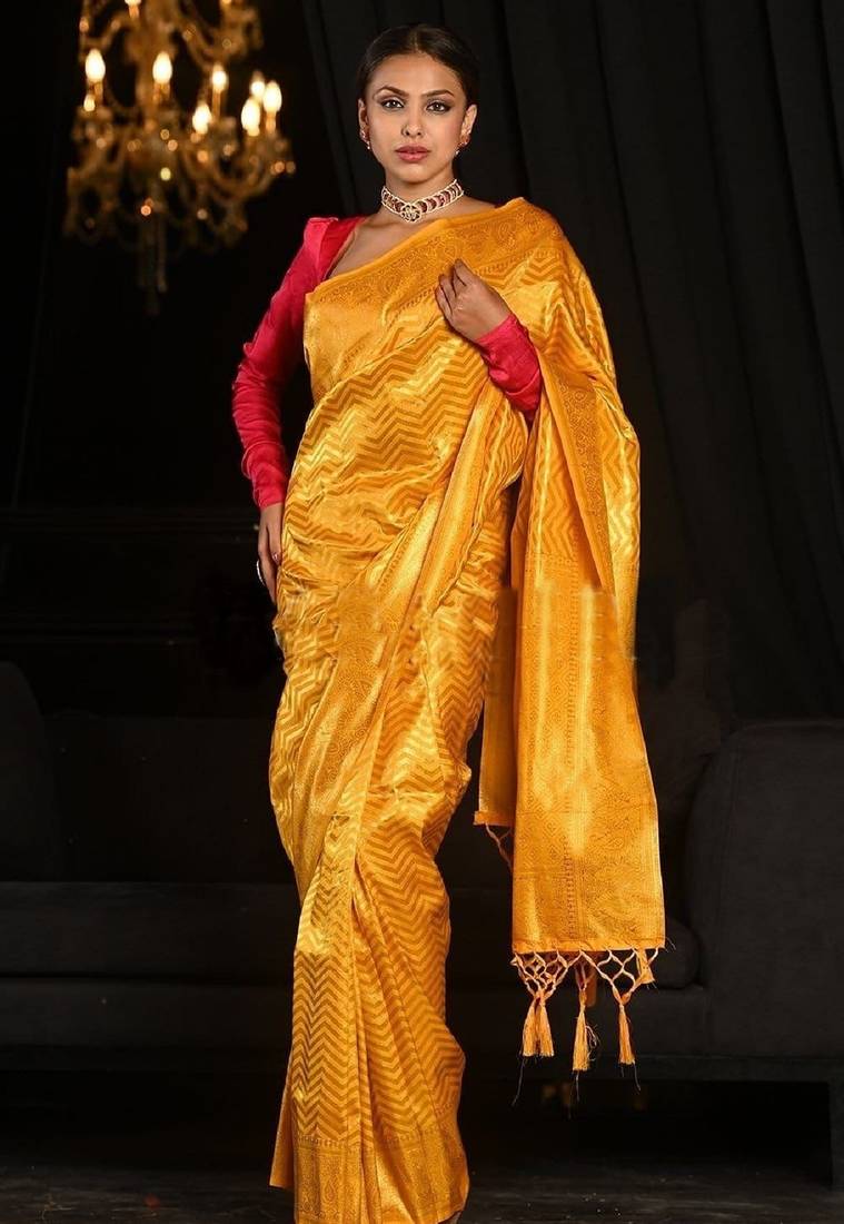 Yellow soft silk blend banarasi jacuard work designer party wear saree with unstitched blouse piece