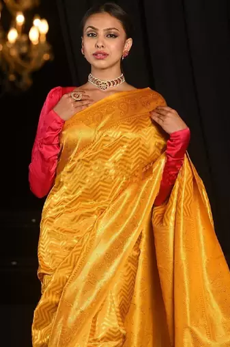 Yellow silk blend banarasi saree with unstitched blouse piece