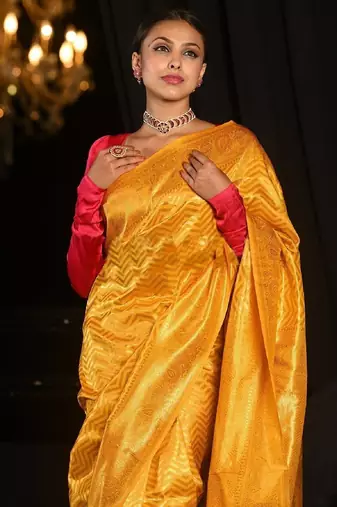 Yellow silk blend banarasi saree with unstitched blouse piece