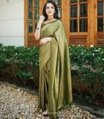 Green silk blend banarasi saree with unstitched blouse piece
