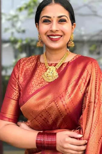 Orange silk blend banarasi saree with unstitched blouse piece