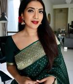 Green silk blend banarasi saree with unstitched blouse piece