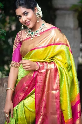 Parrote pink silk blend banarasi saree with unstitched blouse piece