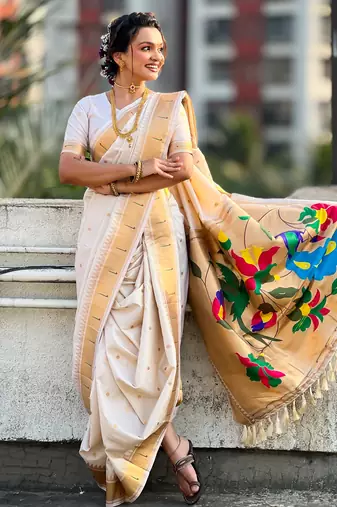 Off white soft silk paithani nauvari zari weaving saree with matching blouse piece