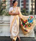 Off white soft silk paithani nauvari zari weaving saree with matching blouse piece