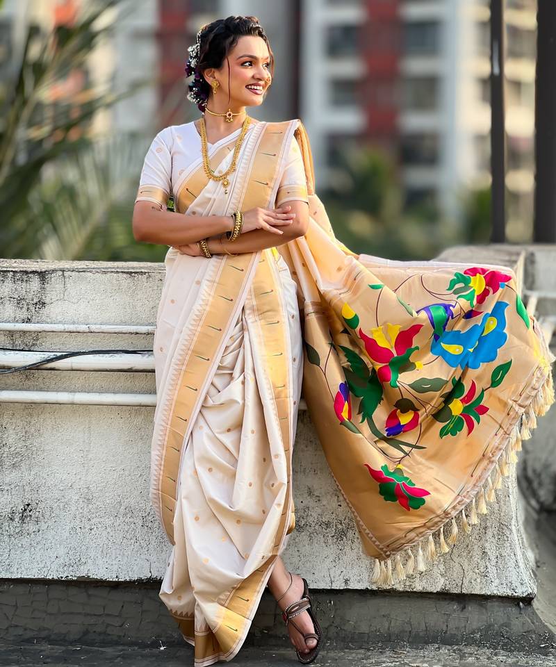 Off white soft silk paithani nauvari zari weaving saree with matching blouse piece