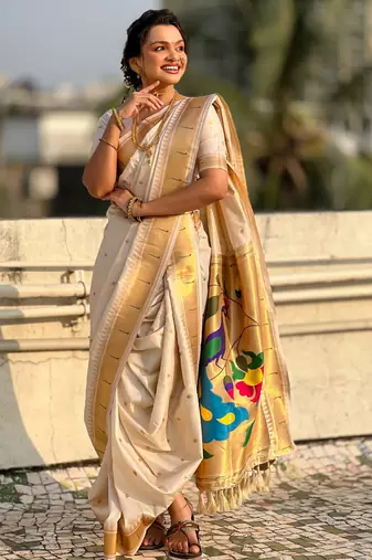 Off white soft silk paithani nauvari zari weaving saree with matching blouse piece