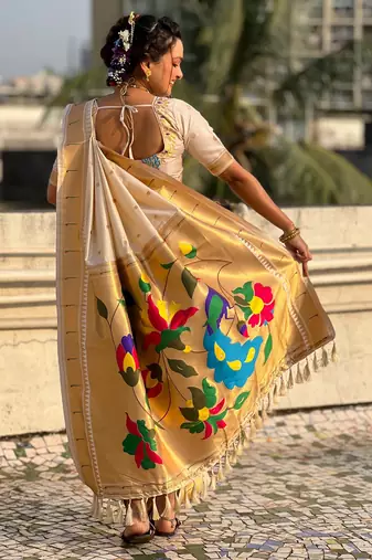 Off white soft silk paithani nauvari zari weaving saree with matching blouse piece