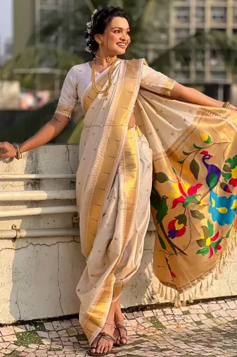 Off white soft silk paithani nauvari zari weaving saree with matching blouse piece
