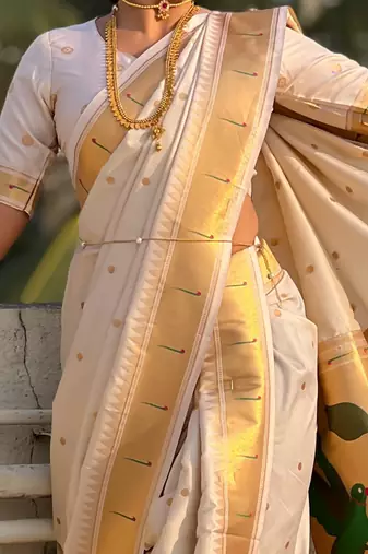 Off white soft silk paithani nauvari zari weaving saree with matching blouse piece