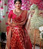 Red silk blend banarasi saree with unstitched blouse piece