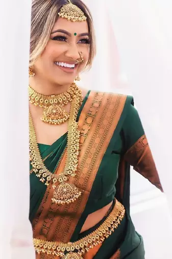 Green silk blend banarasi saree with unstitched blouse piece