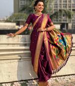 Burgundy soft silk paithani nauvari zari weaving saree with matching blouse piece