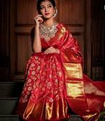 Red silk blend banarasi saree with unstitched blouse piece