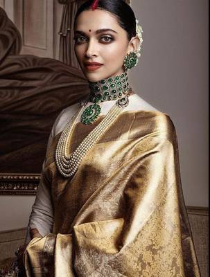 Off white silk blend banarasi saree with unstitched blouse piece 1