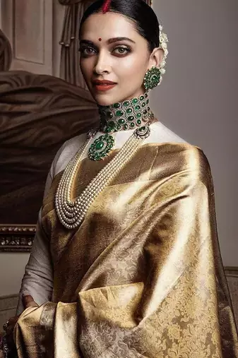 Off white soft silk blend banarasi jacuard work designer party wear saree with unstitched blouse piece