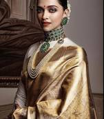 Off white silk blend banarasi saree with unstitched blouse piece