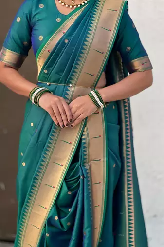 Teal soft silk paithani nauvari zari weaving saree with matching blouse piece