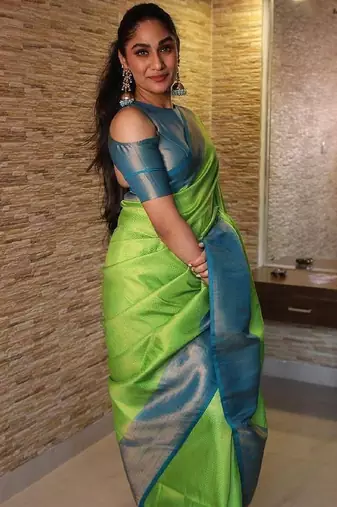 Parrot blue silk blend banarasi saree with unstitched blouse piece