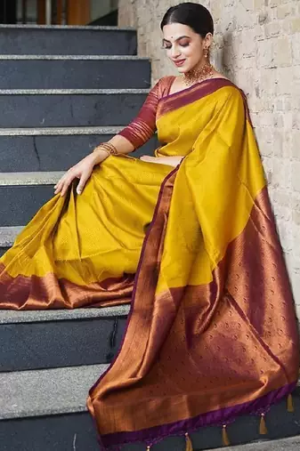 Yellow maroon silk blend banarasi saree with unstitched blouse piece