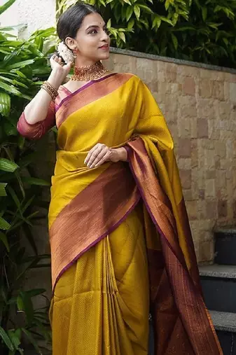 Yellow maroon silk blend banarasi saree with unstitched blouse piece