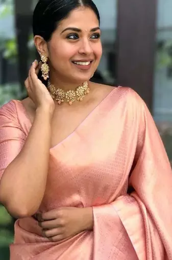 Peach silk blend banarasi saree with unstitched blouse piece
