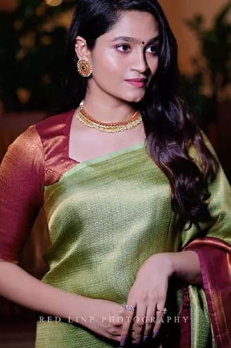 Light green maroon silk blend banarasi saree with unstitched blouse piece