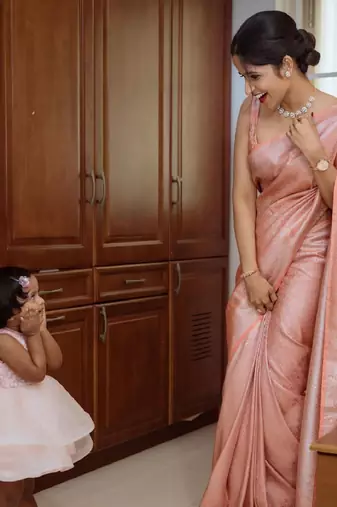Peach silk blend banarasi saree with unstitched blouse piece