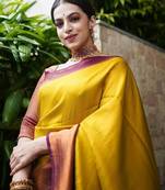 Yellow maroon silk blend banarasi saree with unstitched blouse piece