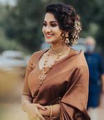 Brown silk blend banarasi saree with unstitched blouse piece