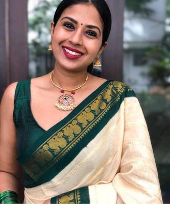 Off white green silk blend banarasi saree with unstitched blouse piece 1