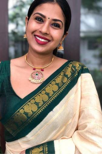 Off white green soft silk blend banarasi jacuard work designer party wear saree with unstitched blouse piece