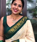Off white green soft silk blend banarasi jacuard work designer party wear saree with unstitched blouse piece
