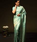Turquoise silk blend banarasi saree with unstitched blouse piece