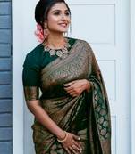 Green silk blend banarasi saree with unstitched blouse piece