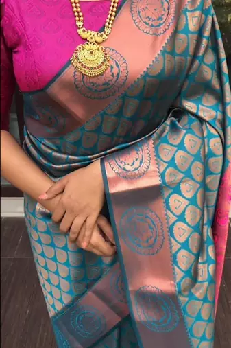 Turquoise silk blend banarasi saree with unstitched blouse piece