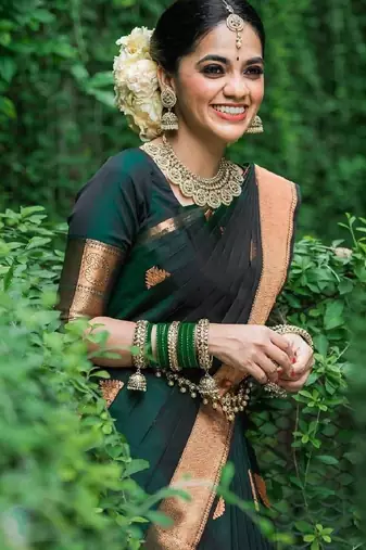 Green silk blend banarasi saree with unstitched blouse piece